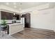 Spacious kitchen with granite countertops and stainless steel appliances and adjoining living and dining areas at 350 High Point Dr # C201, Longmont, CO 80504
