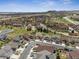 Stunning aerial view of a residential neighborhood, showcasing the homes and surrounding landscape at 4077 Forever Cir, Castle Rock, CO 80109
