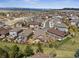 Neighborhood aerial view with manicured lawns, fenced yards, and inviting outdoor living spaces at 4077 Forever Cir, Castle Rock, CO 80109