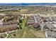 Scenic aerial view of a well-planned community with diverse home styles and green spaces at 4077 Forever Cir, Castle Rock, CO 80109
