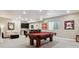 Finished basement features a wet bar and a billiard table at 4077 Forever Cir, Castle Rock, CO 80109