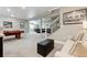 Finished basement with billiards table, sectional seating, and carpeted floors at 4077 Forever Cir, Castle Rock, CO 80109