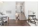 Bright hallway with modern decor leads to the upper level bedrooms and basement at 10275 Quail St, Westminster, CO 80021