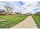 Community green space with sidewalks, perfect for walking and outdoor activities within the neighborhood at 10275 Quail St, Westminster, CO 80021