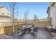 Private backyard patio with fire pit and seating at 2932 Low Meadow Blvd, Castle Rock, CO 80109