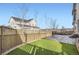 Landscaped backyard with patio and lawn at 2932 Low Meadow Blvd, Castle Rock, CO 80109