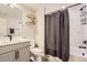 Clean bathroom with a bathtub, shower, and modern vanity at 2932 Low Meadow Blvd, Castle Rock, CO 80109