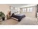 Spacious bedroom with carpeted floors and large windows at 2932 Low Meadow Blvd, Castle Rock, CO 80109