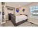 Cozy bedroom with built-in drawers and window seat at 2932 Low Meadow Blvd, Castle Rock, CO 80109