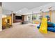 The finished basement includes a play area, built-ins, and ample space for recreation at 14310 Inca St, Westminster, CO 80023