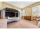 Bedroom featuring warm earth tones, carpet, and ample natural light at 14310 Inca St, Westminster, CO 80023