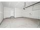 Bright, unfinished two car garage at 21142 E 63Rd Dr, Aurora, CO 80019