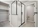 Contemporary glass shower with white tile surround and modern fixtures at 21142 E 63Rd Dr, Aurora, CO 80019
