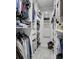 A walk-in closet with custom shelving and storage for clothes and shoes at 12020 W Alabama Pl, Lakewood, CO 80228