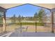 Relaxing back porch view overlooking sprawling fenced acreage and majestic snow-capped mountain views at 2610 W County Road 4, Berthoud, CO 80513