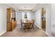 Traditional dining room boasts wood table set, hutch, and tray ceiling detail at 2610 W County Road 4, Berthoud, CO 80513