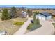 Two-story home with a detached oversized garage, set on a spacious lot with mature trees at 2610 W County Road 4, Berthoud, CO 80513