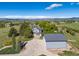 Charming home featuring mountain views, a spacious driveway, and a detached garage/workshop at 2610 W County Road 4, Berthoud, CO 80513