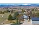 Charming home with mountain views, boasting a large yard and a barn-style detached garage at 2610 W County Road 4, Berthoud, CO 80513