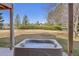 A relaxing backyard hot tub looks out over beautifully landscaped acreage and mountain views at 2610 W County Road 4, Berthoud, CO 80513