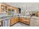 Bright kitchen features granite countertops and stainless steel dishwasher at 2610 W County Road 4, Berthoud, CO 80513