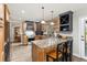 Spacious kitchen island with granite counters and stainless steel appliances at 2610 W County Road 4, Berthoud, CO 80513