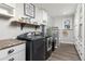 Well-equipped laundry room with modern appliances and ample storage at 2610 W County Road 4, Berthoud, CO 80513