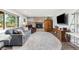 Inviting living room features a brick fireplace, comfortable seating, and natural light at 2610 W County Road 4, Berthoud, CO 80513