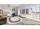 Bright sunroom with large windows and sliding glass door at 2610 W County Road 4, Berthoud, CO 80513