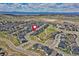 Aerial view of a Primary-planned community with mountain views at 6521 Barnstead Dr, Castle Pines, CO 80108