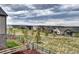 Landscaped backyard view overlooking the community at 6521 Barnstead Dr, Castle Pines, CO 80108