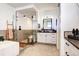 Modern bathroom featuring a glass-enclosed shower and vanity at 6521 Barnstead Dr, Castle Pines, CO 80108