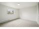 Minimalist room featuring natural lighting from large windows at 2448 S Leyden St, Denver, CO 80222