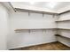 Walk-in closet showing wooden shelving at 2448 S Leyden St, Denver, CO 80222
