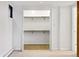 Walk-in closet showing double doors and adjustable metal racks at 2448 S Leyden St, Denver, CO 80222