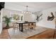 View of dining room featuring hardwood floors and bright light at 2448 S Leyden St, Denver, CO 80222