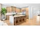 Spacious kitchen with large center island, modern appliances, and bright cabinetry at 265 S Monroe St, Denver, CO 80209