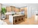 Beautiful kitchen with sleek island, modern appliances, and hardwood floors at 265 S Monroe St, Denver, CO 80209