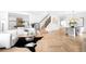 Bright living room with stylish decor, light wood floors and staircase at 265 S Monroe St, Denver, CO 80209