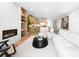 Inviting living space with modern design elements, fireplace, and open concept layout at 265 S Monroe St, Denver, CO 80209