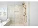 Modern shower featuring bronze shower head and fixtures at 265 S Monroe St, Denver, CO 80209