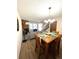Inviting dining area adjacent to the living room, perfect for Gathering meals and gatherings at 1240 S Flower Cir # A, Lakewood, CO 80232