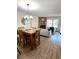Living room with fireplace and dining room area at 1240 S Flower Cir # A, Lakewood, CO 80232