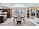 Spacious dining room with modern light fixture and kitchen views at 2008 Galapago, Denver, CO 80223