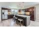 Modern kitchen with stainless steel appliances and an island at 2008 Galapago, Denver, CO 80223