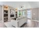 Living room with fireplace, built-in shelving and modern decor at 2008 Galapago, Denver, CO 80223