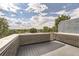 Rooftop deck with brick wall and composite decking, offering mountain views at 2008 Galapago, Denver, CO 80223