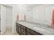 Bathroom features a granite countertop with dual sinks and modern fixtures, alongside a separate toilet room at 3197 Cool Meadow Pl, Castle Rock, CO 80104