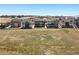 Aerial shot showing backyard views, a fence line and neighboring properties at 3399 Backdrop Ct, Castle Rock, CO 80108