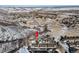 Aerial view of home and surrounding mountain landscape at 6980 Fargo Trl, Littleton, CO 80125